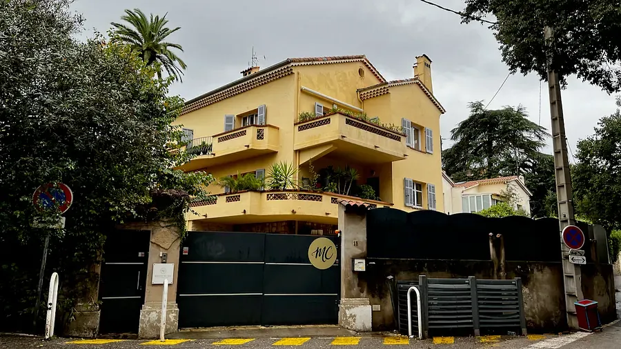 A yellow apartment building in Le Suquet, Cannes