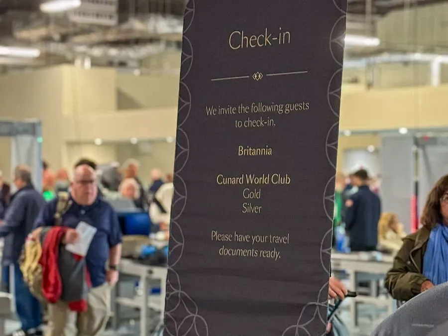 A sign calling priority guests to a special check-in