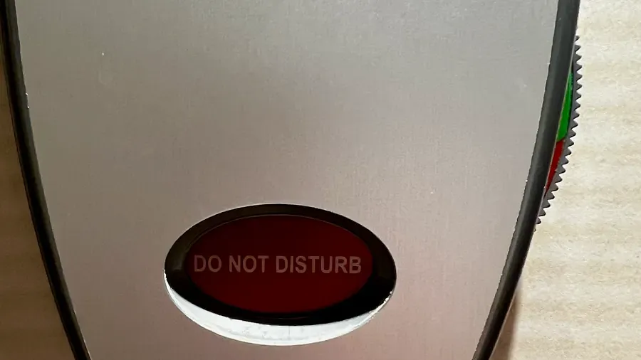 A cruise door dial reading Do Not Disturb 