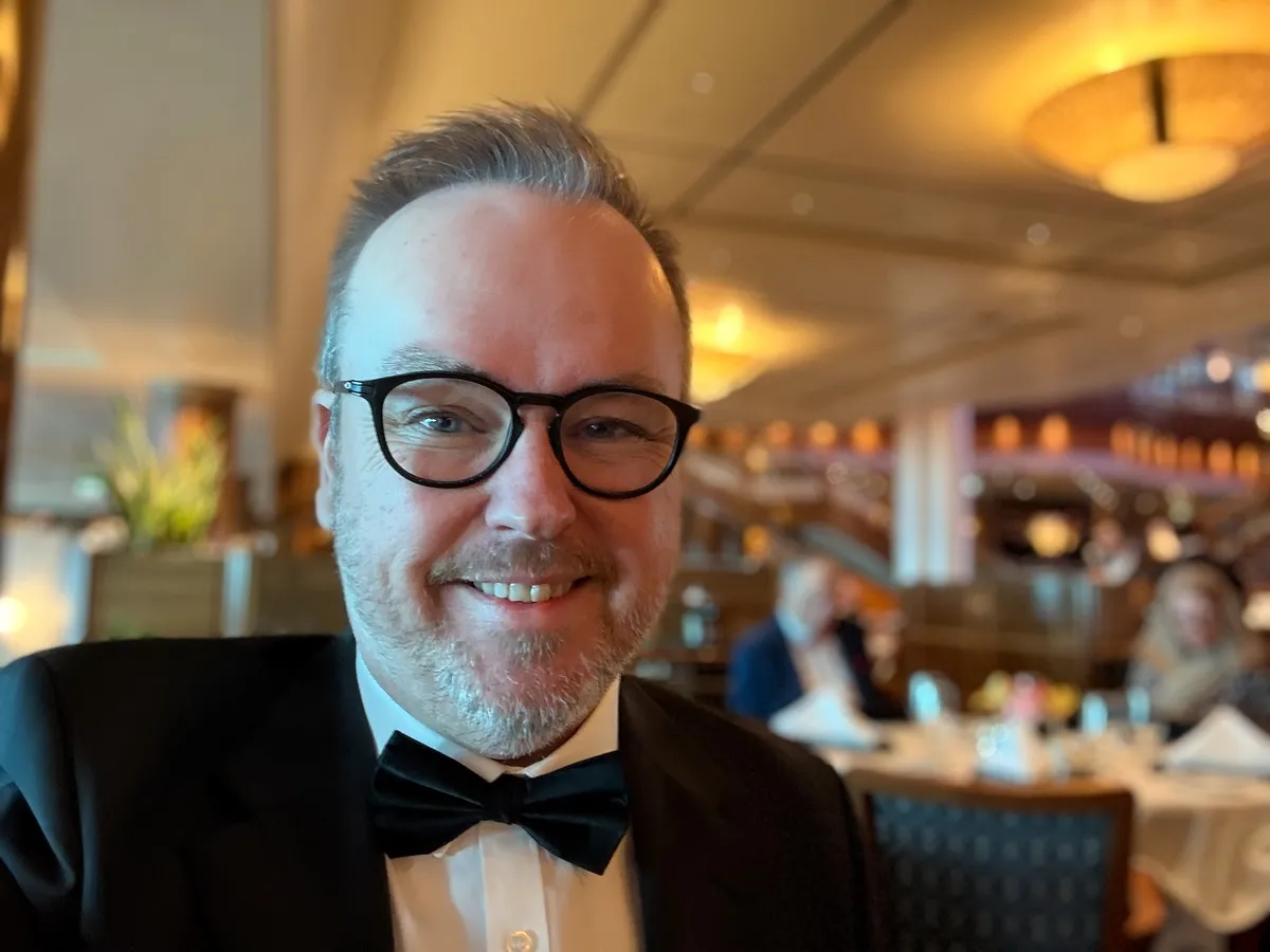 Patrick in black tie aboard Queen Mary 2 during a Gala Evening on a Transatlantic crossing
