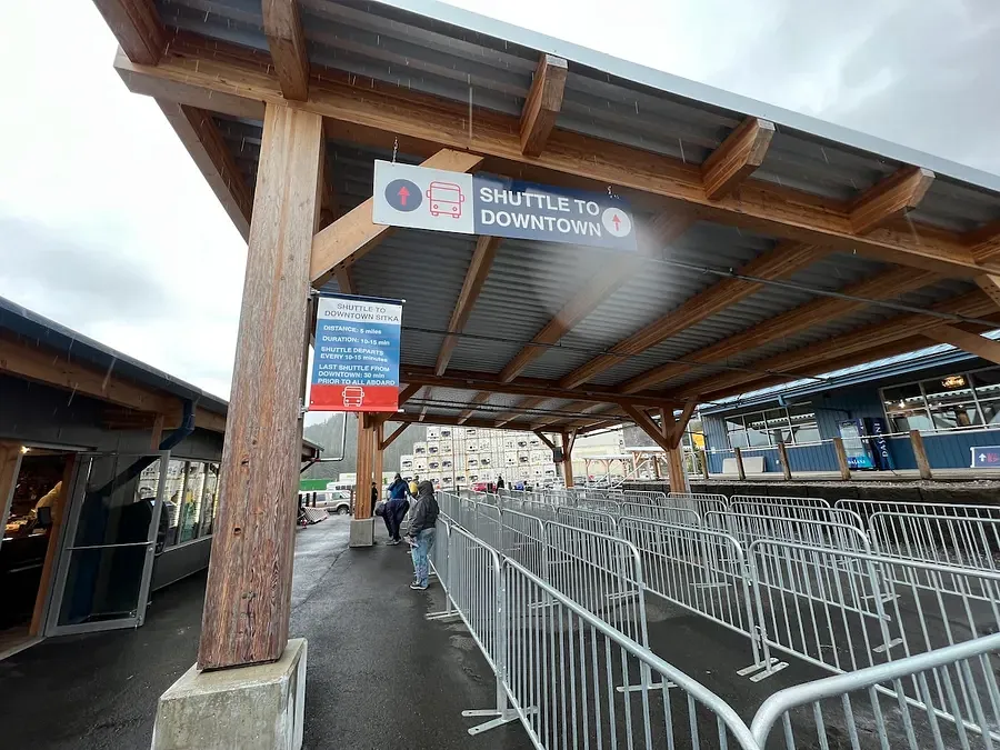 A sign saying Shuttle to Downtown at Sitka Port
