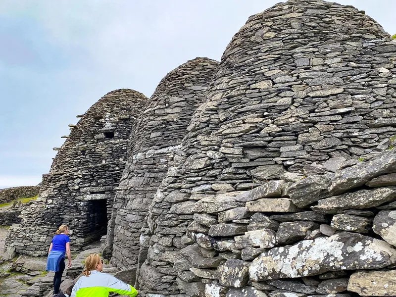 Visitors exploring the beehive huts on Skellig Michael, County Kerry. Copyright: Tourism Ireland