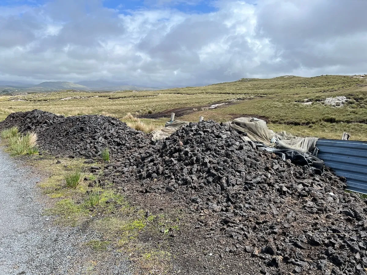Connemara bog landscape with turf stacks, County Galway