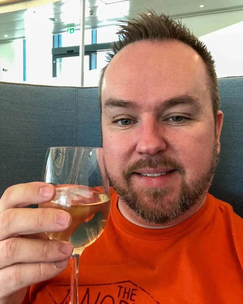 Patrick Hughes enjoying a glass of wine at 51st & Green Lounge