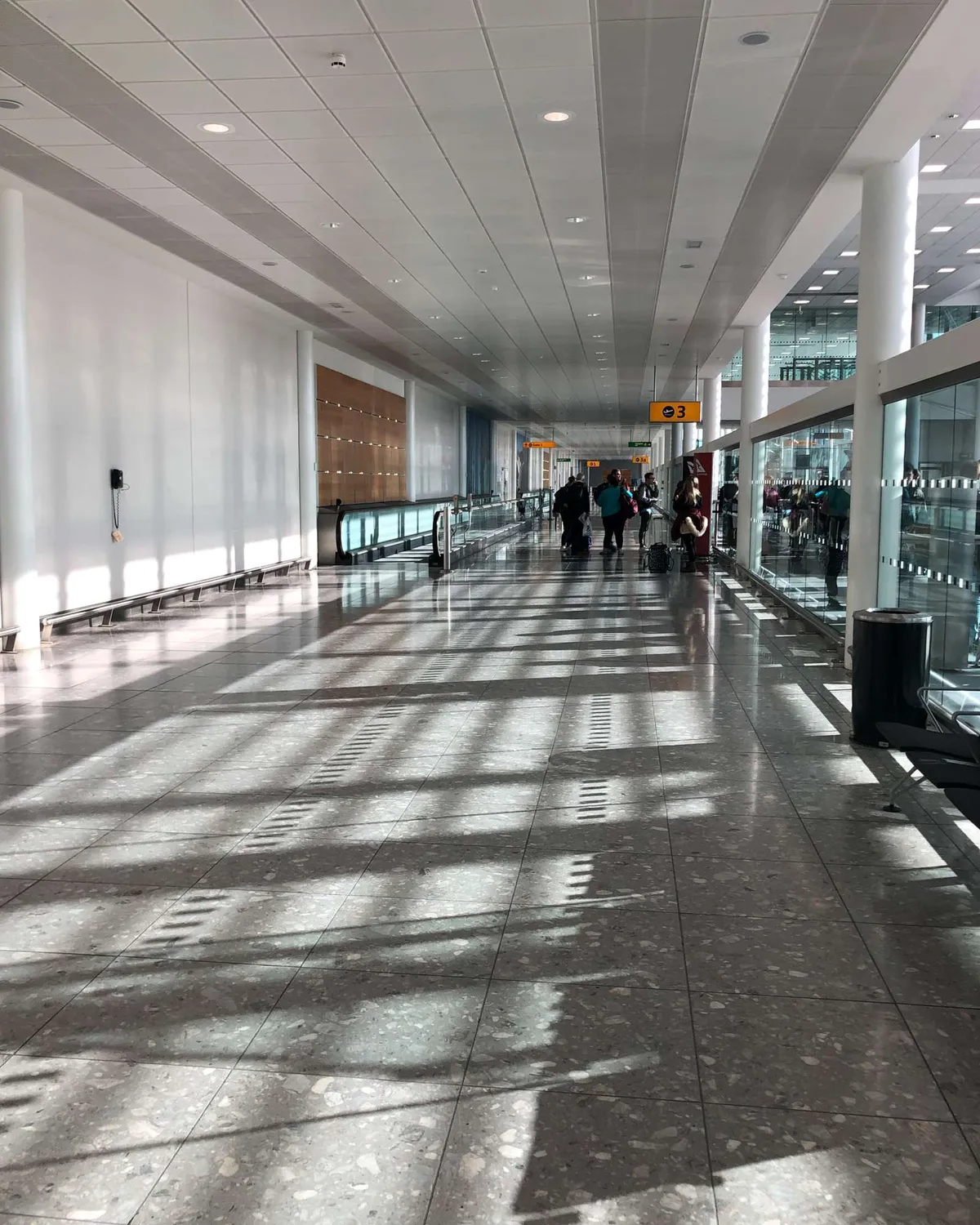 Qantas QF10 Flight Review - This shows the long corridor at Heathrow just before passengers must pass through pre-screening. 