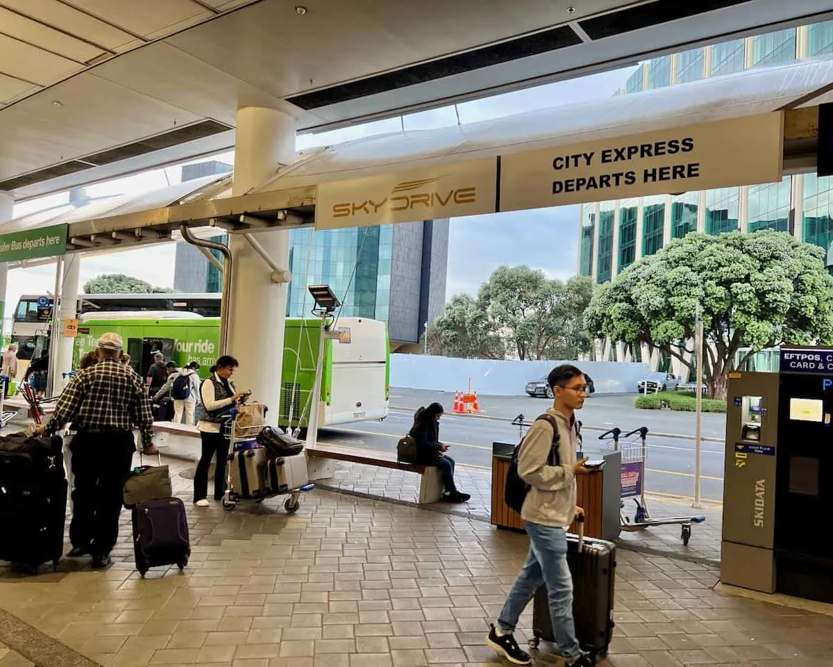 The ground transportation area outside Auckland International with its many signposts