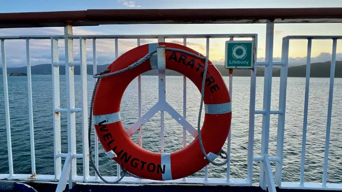 A life ring that reads Aratere Wellington on board a ferry in New Zealand 
