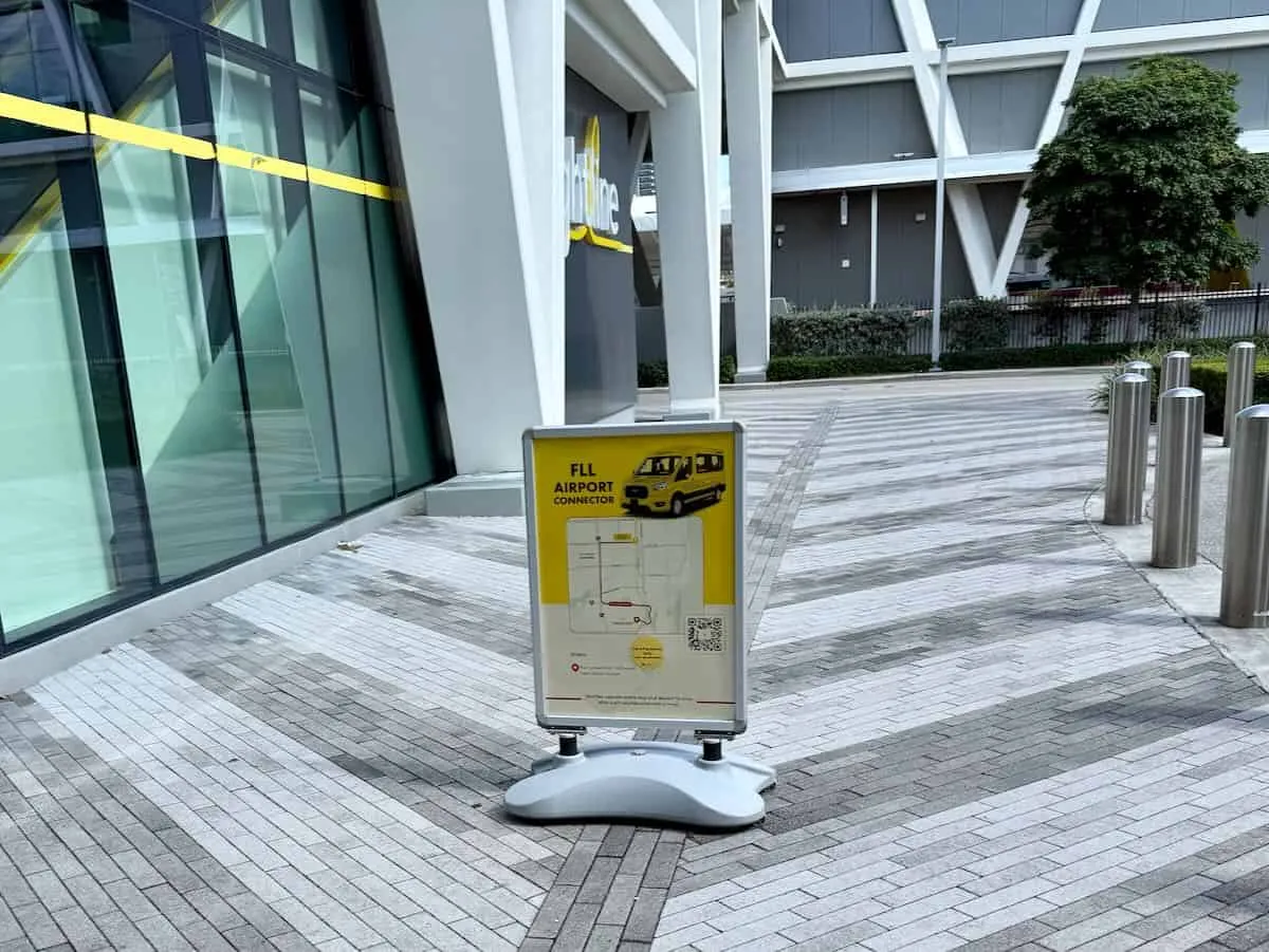 A yellow sign reading FLL Airport Connector