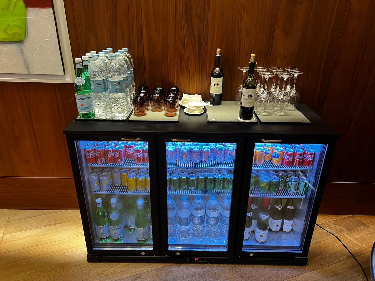 A fridge containing soft drinks and wine at the Oryx Lounge, Doha