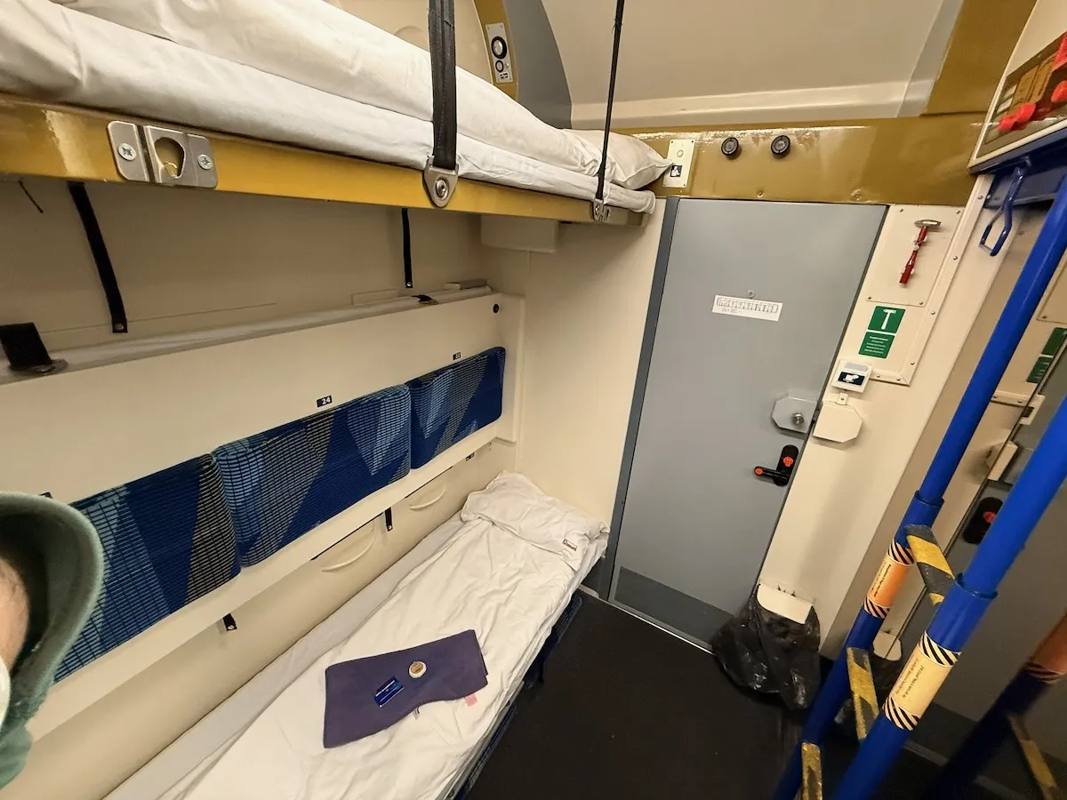 Sleeper train cabin at night