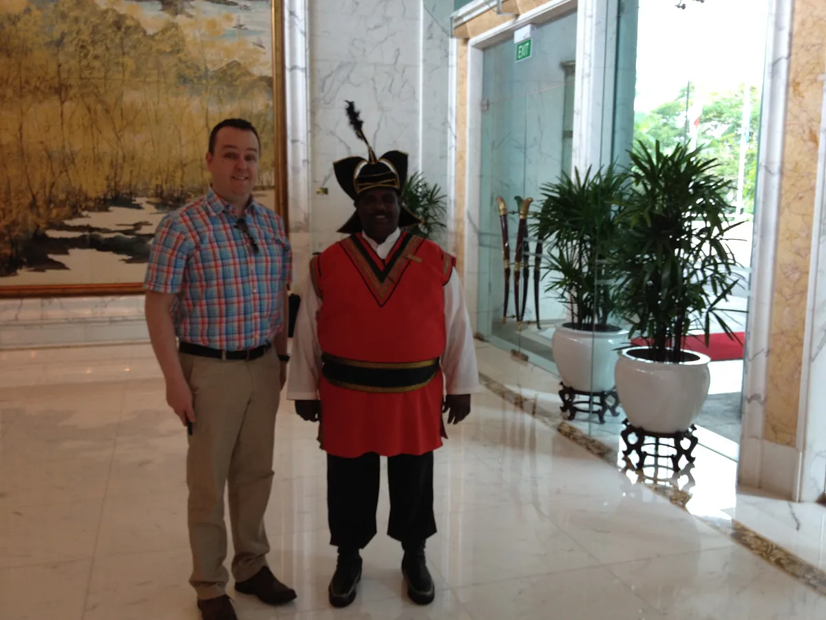 Hotel lobby with doorman at Shangri-La Singapore