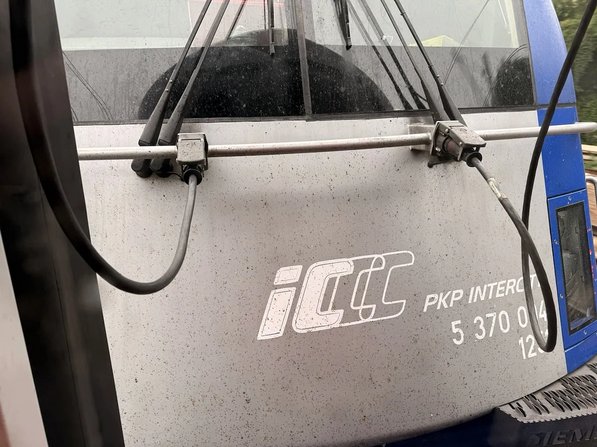 PKP Intercity train exterior showing iCiC logo and windshield wipers on a Polish train